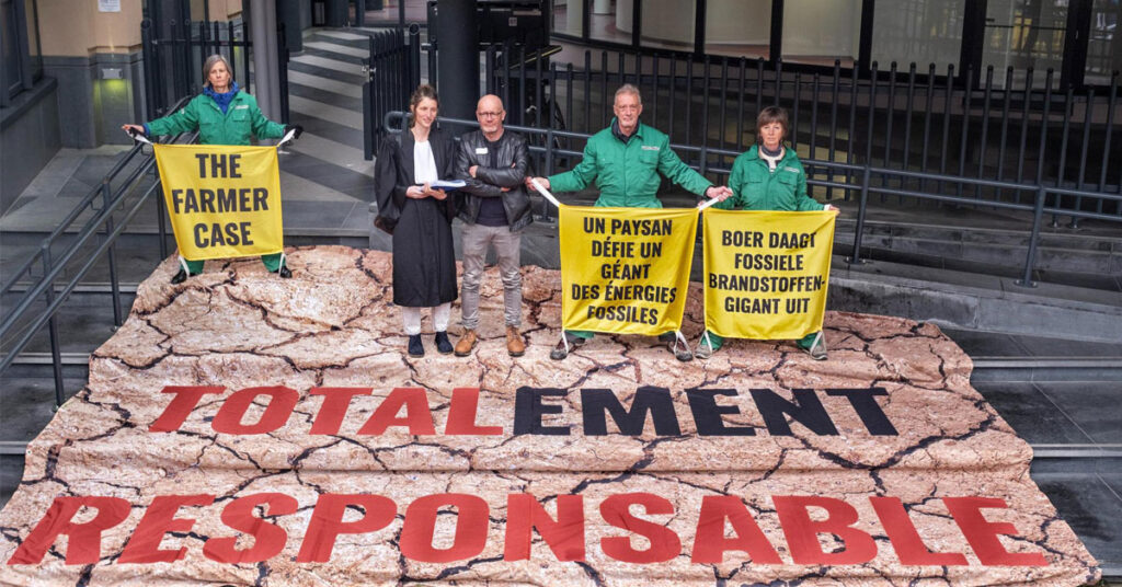 Pakistani and Filipino farmers protesting against fossil fuel polluters, demanding climate justice and compensation for crop losses caused by floods and storms
