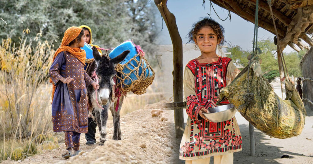 Women and children carrying water containers across rocky mountain paths in Kunraj, Balochistan due to clean water shortage