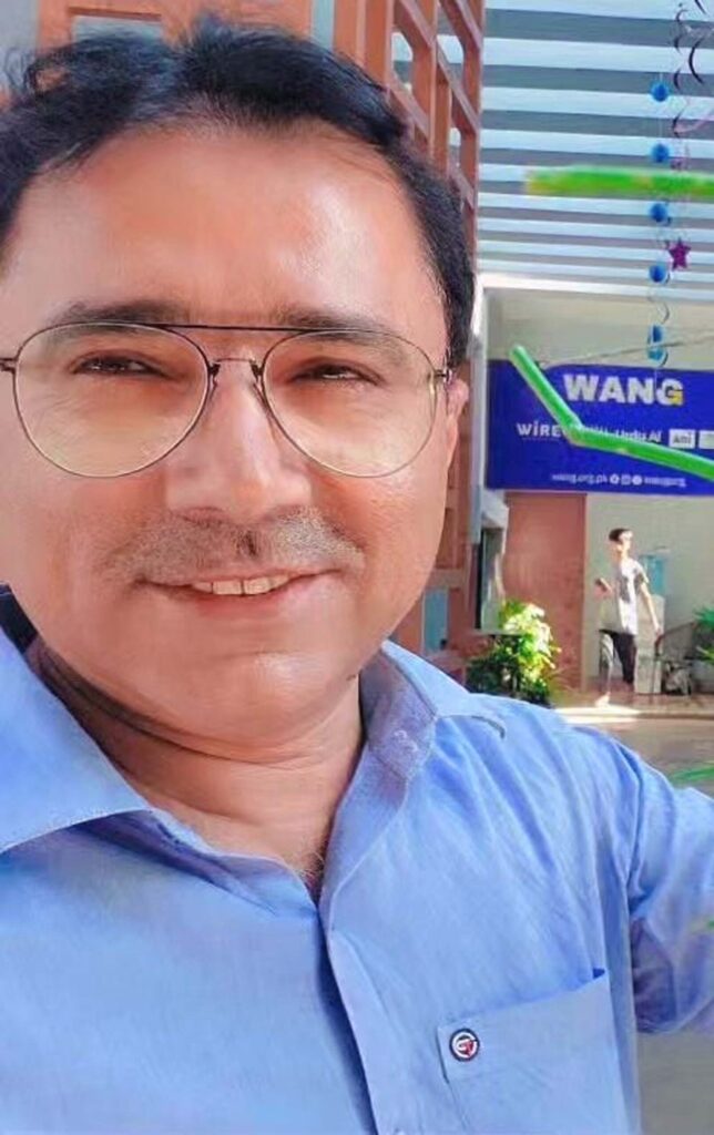 Women and children carrying water containers across rocky mountain paths in Kunraj, Balochistan due to clean water shortage
