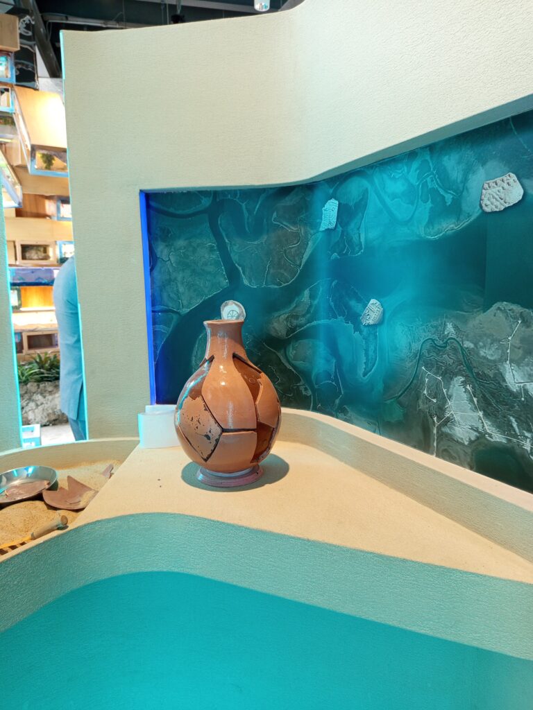 Visitors exploring the Lost Cities of the Indus Delta exhibition showcasing ancient maritime civilizations in Karachi.