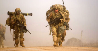 War explosions releasing toxic gases and smoke during summer causing climate change, air pollution and global warming environmental crisis