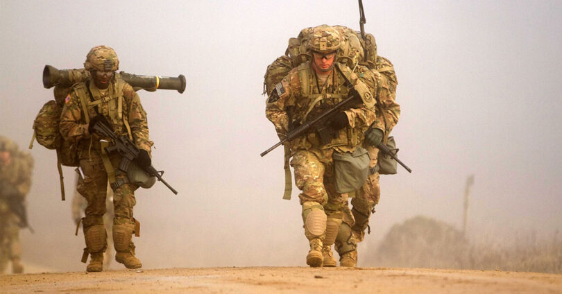 War explosions releasing toxic gases and smoke during summer causing climate change, air pollution and global warming environmental crisis