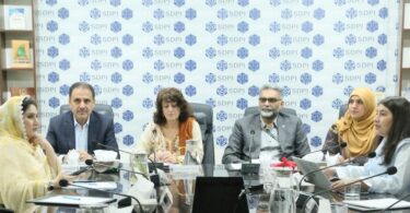 Experts and officials attending a meeting at SDPI Islamabad discussing glacier melting and climate risks